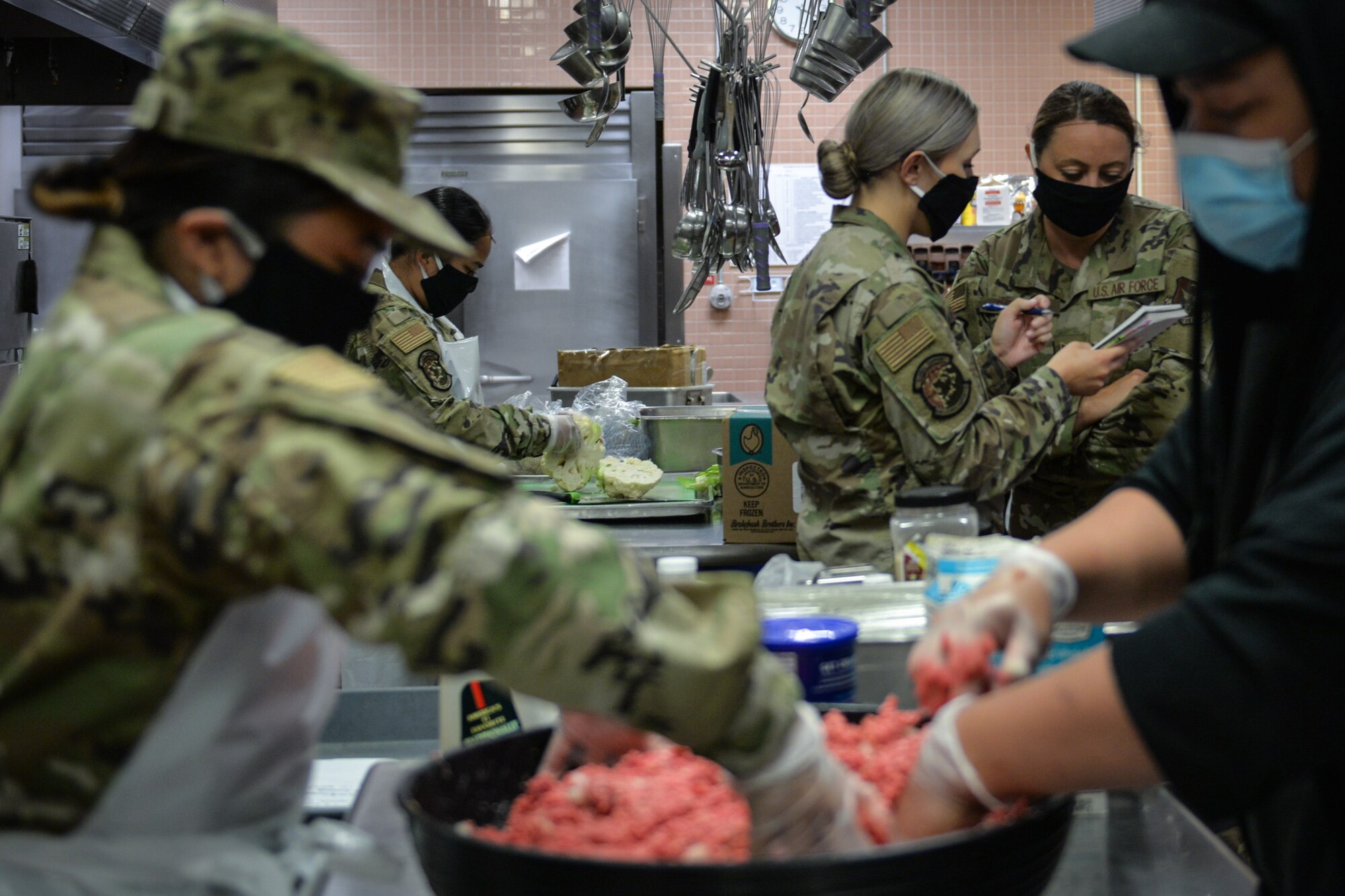 Reserve Citizen Airmen from the 446th Force Support Squadron take over dining facility operations.