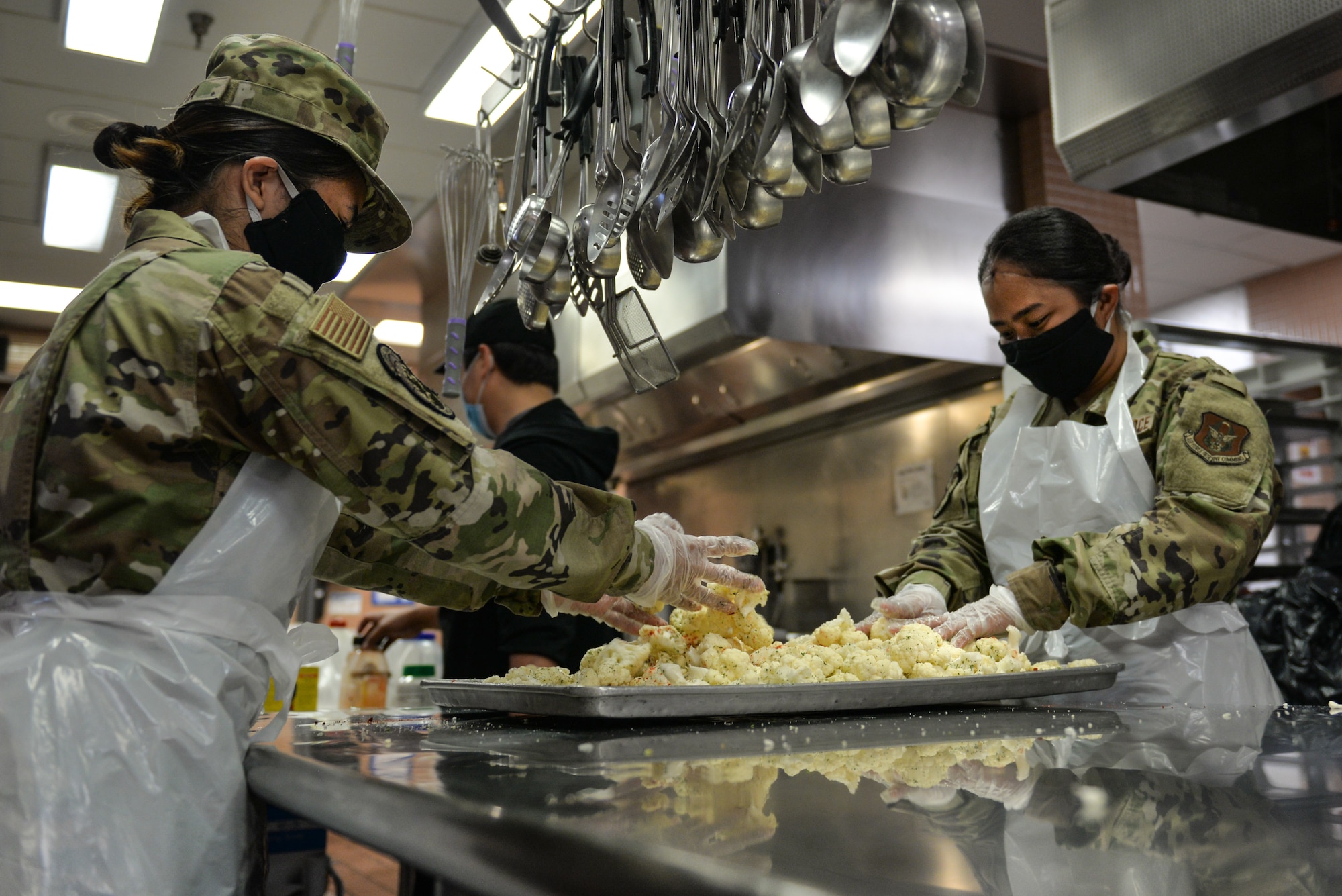 Reserve Citizen Airmen from the 446 Force Support Squadron take over the operation of the Olympic Dining Facility Aug. 19-20.