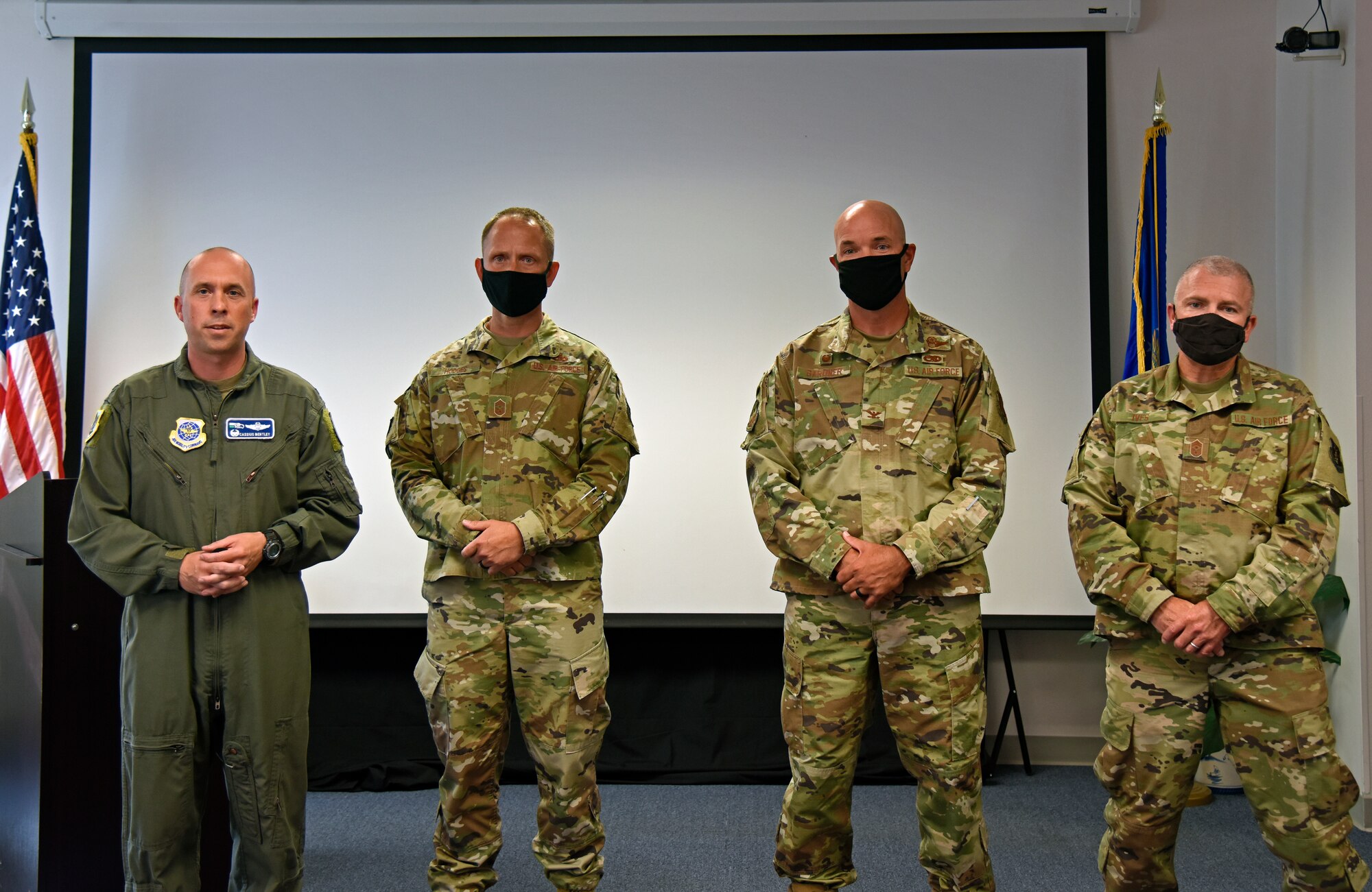 (from left) U.S. Air Force Col. Cassius Bentley, 92nd Air Refueling Wing commander, Chief Master Sgt. Jason Hodges, 92nd ARW Command Chief, Col. Larry Gardner, 141st ARW commander, and Chief Master Sgt. Brandon Ives, 141st ARW command chief, make opening remarks for the Back-to-School Town Hall at Fairchild Air Force Base, Washington, Aug. 20, 2020. Team Fairchild hosted a virtual Town Hall alongside fellow school district leaders and subject matter experts to discuss issues related to children returning to school and needing childcare amongst the COVID-19 pandemic. (U.S. Air Force photo by Staff Sgt. Jesenia Landaverde)
