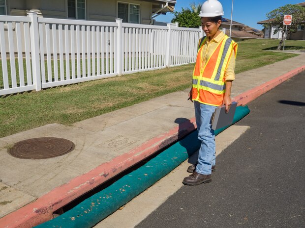 Protection berms placed at storm drain openings