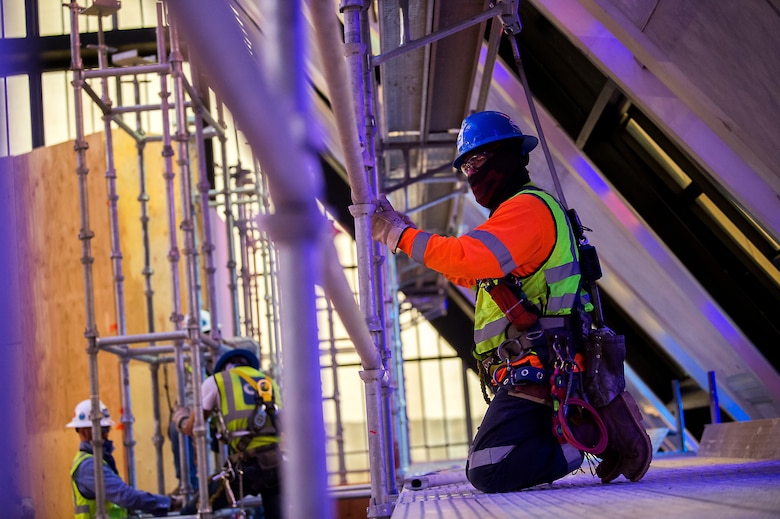 Crews erect scaffolding around the interior of the U.S. Air Force Academy Cadet Chapel in Colorado Springs, Colorado, May 11, 2020.