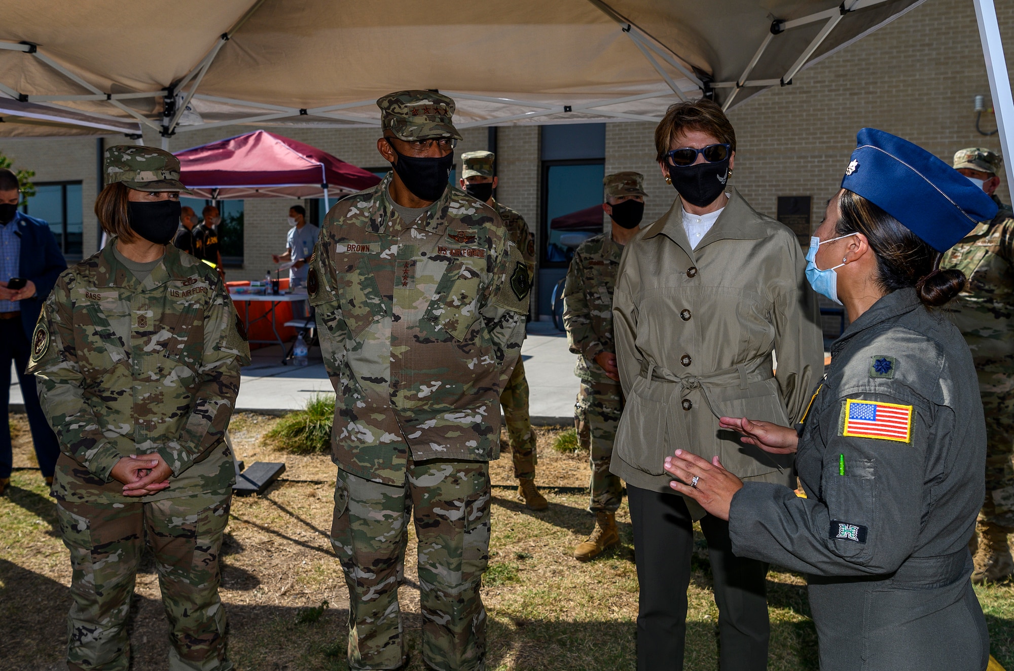 Lt. Col. Marie Han, 559th Medical Group, briefs U.S. Secretary of the Air Force Barbara Barrett, Chief of Staff of the Air Force Gen. Charles Q. Brown, Jr. and Chief Master Sergeant of the Air Force JoAnne Bass Aug. 21, 2020, at Joint Base San Antonio-Lackland, Texas.