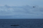 An MH-60R “Seahawk” assigned to Helicopter Maritime Strike Squadron 60 (HSM 60) embarked onboard the Arleigh Burke-class guided-missile destroyer USS Nitze (DDG 94) with embarked U.S. Coast Guard (USCG) Law Enforcement Detachment (LEDET) team conducts enhanced counter narcotics operations Aug. 4, 2020. Nitze and embarked LEDET recovered 725 kilograms of suspected cocaine and 3,190 pounds of suspected marijuana. Nitze is deployed to the U.S. Southern Command area of responsibility to support counter illicit drug trafficking in the Caribbean and Eastern Pacific. (U.S. Navy Photo by Gunners Mate 3rd Class Jessica Telfer/Released)