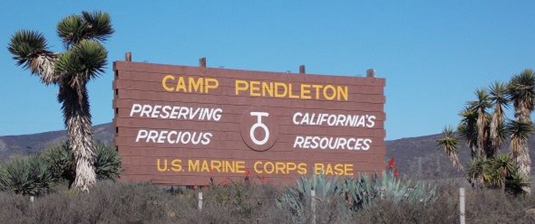 In an undated photo, the sign for Marine Corps Base Camp Pendleton, California, posted along Interstate Highway 5 reads, 'Preserving California's Precious Resources.' Camp Pendleton is the premier Fleet Marine Force training base on the West Coast. (Courtesy Photo)