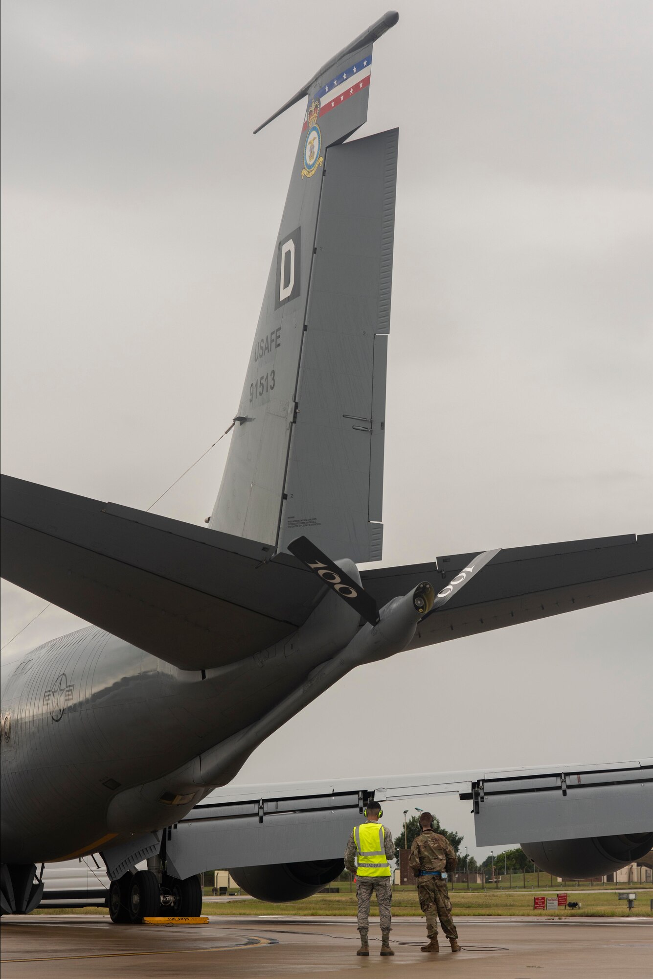 Airman 1st Class Nahyan Rivera-Wong, 100th Aircraft Maintenance Squadron aerospace propulsion apprentice, left, and Airman Drake Koenig-Frederickson, 100th AMXS aerospace propulsion journeyman, wait for the arrival of KC-135 Stratotanker aircraft aircrew members before a training mission at Royal Air Force Mildenhall, England, Aug. 19, 2020. Maintenance operations support the readiness of aircraft to deliver aerial refueling throughout the U.S. Air Forces in Europe and Air Forces Africa theater. (U.S. Air Force photo by Airman 1st Class Joseph Barron)