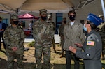 Lt. Col. Marie Han, 559th Medical Group, briefs U.S. Secretary of the Air Force Barbara Barrett, Chief of Staff of the Air Force Gen. Charles Q. Brown, Jr. and Chief Master Sergeant of the Air Force JoAnne Bass Aug. 21, 2020, at Joint Base San Antonio-Lackland, Texas.