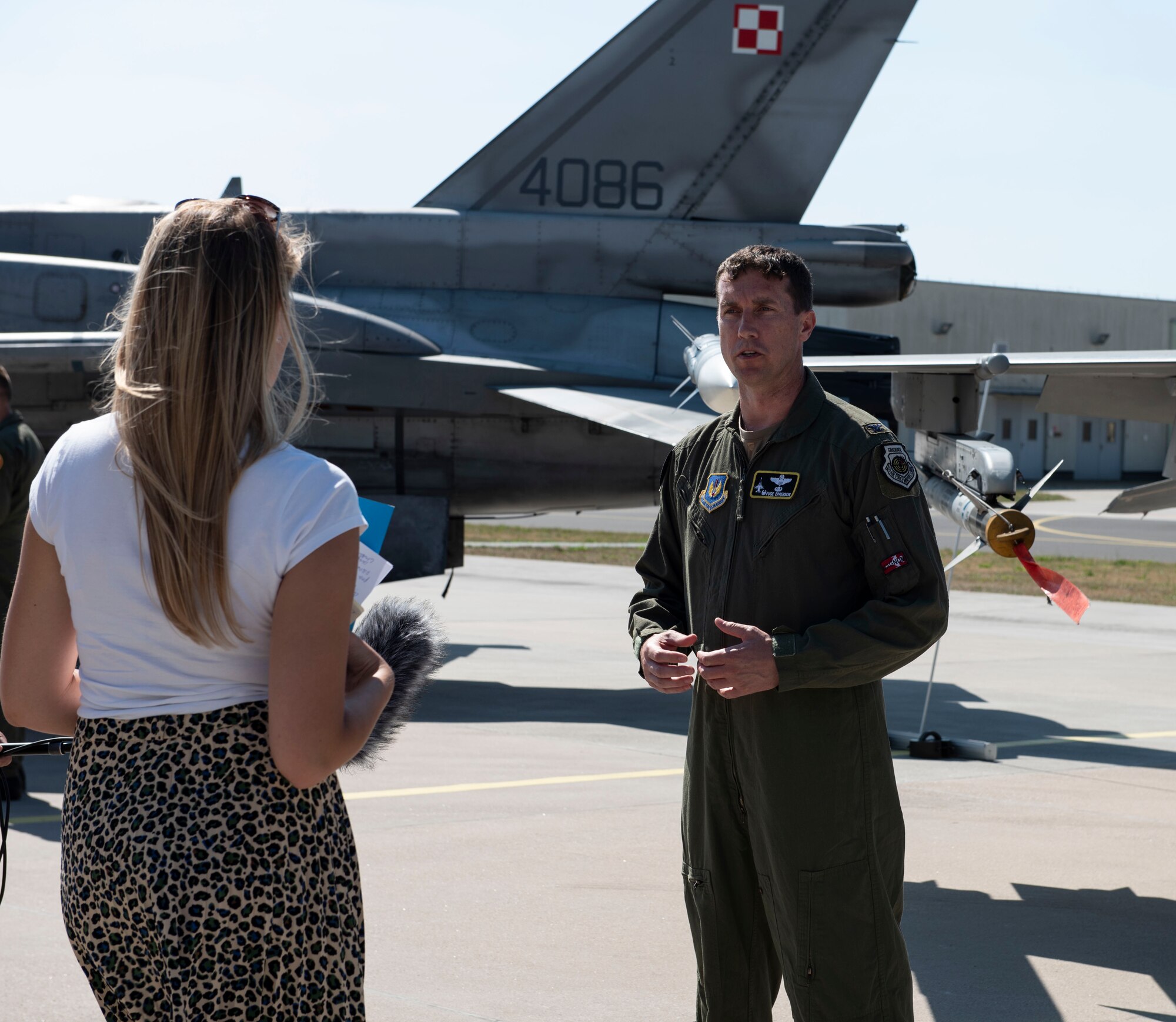 U.S. Air Force Col. David Epperson, 52nd Fighter Wing commander, receives an interview by Polish media at Łask AB, Poland, August 21, 2020. Epperson discussed the purpose of Aviation Detachment Rotation 20.4 and the importance of the partnership and friendship between the United States and Polish Allies. (U.S. Air Force photo by Senior Airman Melody W. Howley)
