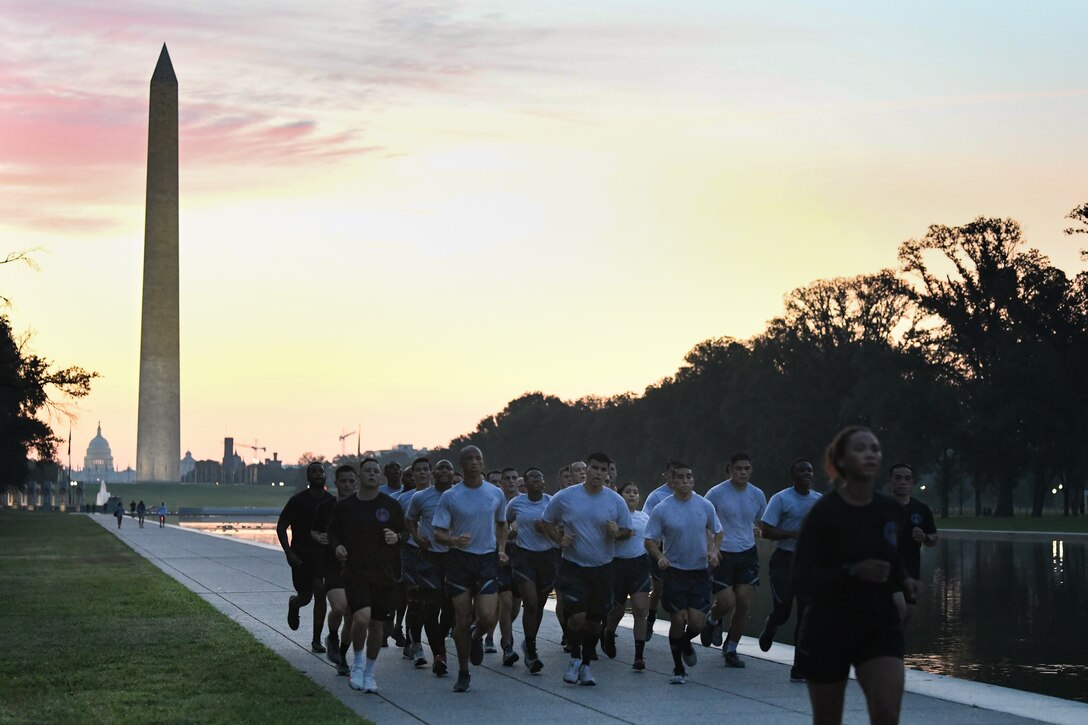 Airmen from the 816th Security Forces Squadron enrolled in the “Pre-Raven” Fly-Away Course run a 6-mile lap from the Lincoln Memorial to the United States Capitol, completing it when they return to the Lincoln Memorial in Washington D.C., Aug. 21, 2020.
