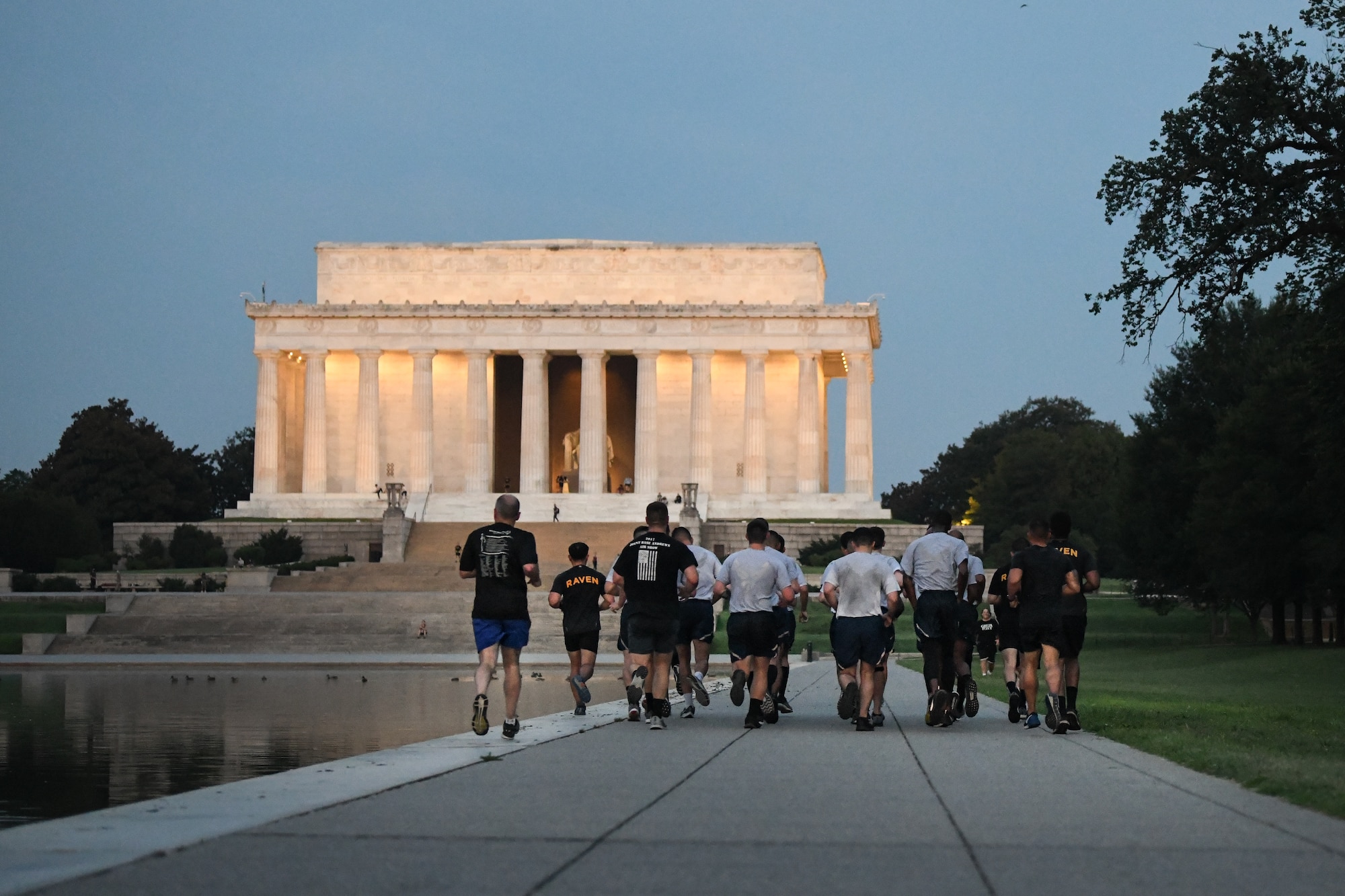 Airmen from the 816th Security Forces Squadron enrolled in the “Pre-Raven” Fly-Away Course run a 6-mile lap from the Lincoln Memorial to the United States Capitol, completing it when they return to the Lincoln Memorial in Washington D.C., Aug. 21, 2020.