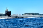 USS Henry M. Jackson (SSBN 730) returns home after completing the submarine's 100th strategic deterrent patrol, Aug. 5.