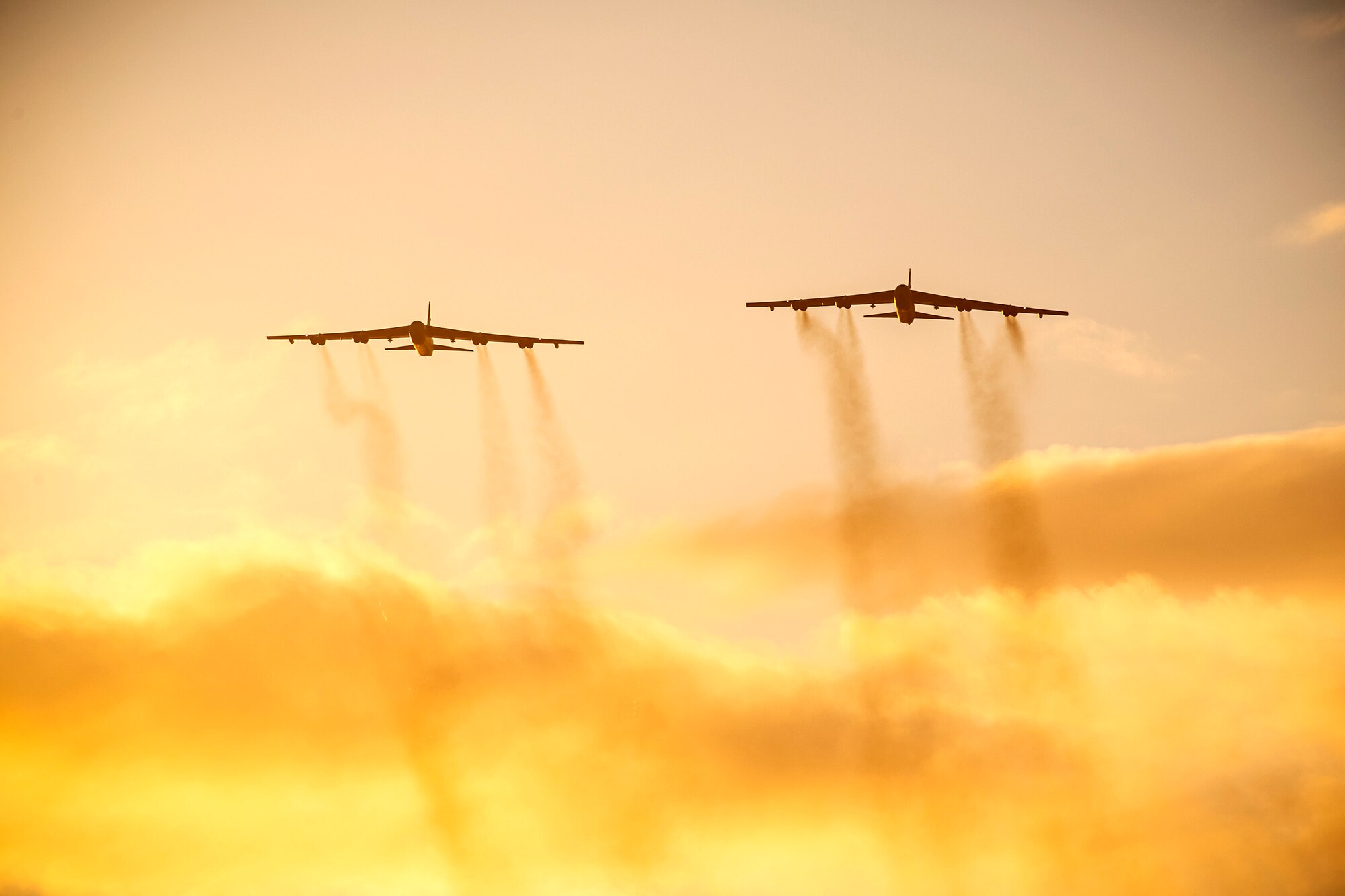 Two B-52 Stratofortressess fly overhead at RAF Fairford, England, Aug. 22, 2020. Strategic bombers contribute to stability in the European theater as they are intended to deter conflict rather than instigate it. If called upon, U.S. bombers offer a rapid response capability. (U.S. Air Force photo by Senior Airman Eugene Oliver)