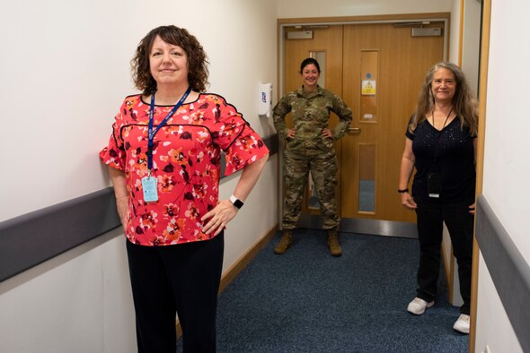 Lisa Clifton (left), 423rd Medical Squadron early childhood special educator, Maj. Darnell Schuettler (center) 423rd MDS Educational and Developmental Intervention Services (EDIS) program manager and mental health flight commander, Gail Slaughter (right), 423rd MDS pediatric occupational therapist, pose for a group photo at RAF Alconbury, England, Aug. 20, 2020. The EDIS program provides support to children who have developmental or special educational needs in their homes or classrooms. (U.S. Air Force photo by Airman 1st Class Jennifer Zima).