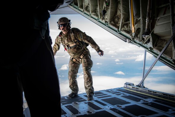 Air Force Reserve Survival, Evasion, Resistance and Escape specialists prepares to parachute out the ramp of a C-130J Super Hercules near Charleston, W. Va., Aug. 23, 2020. Eight C-130s and Reserve and Guard partners converged to participate in a week-long training event. The training scenario was designed to test the abilities of Air Force Reserve units to execute rapid global mobility missions in challenging, contested scenarios. (U.S. Air Force Reserve photo by Senior Airman Nathan Byrnes)