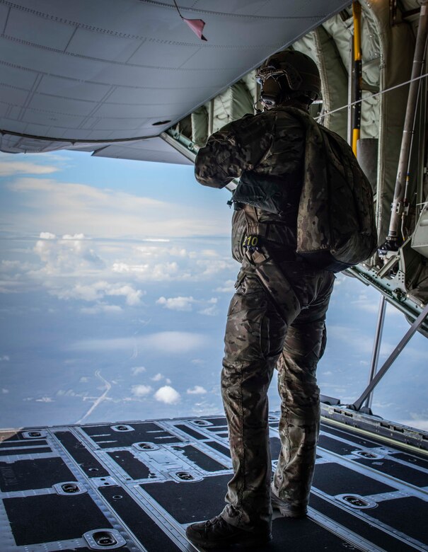Air Force Reserve Survival, Evasion, Resistance and Escape specialists prepares to parachute out the ramp of a C-130J Super Hercules near Charleston, W. Va., Aug. 23, 2020. Eight C-130s and Reserve and Guard partners converged to participate in a week-long training event. The training scenario was designed to test the abilities of Air Force Reserve units to execute rapid global mobility missions in challenging, contested scenarios. (U.S. Air Force Reserve photo by Senior Airman Nathan Byrnes)