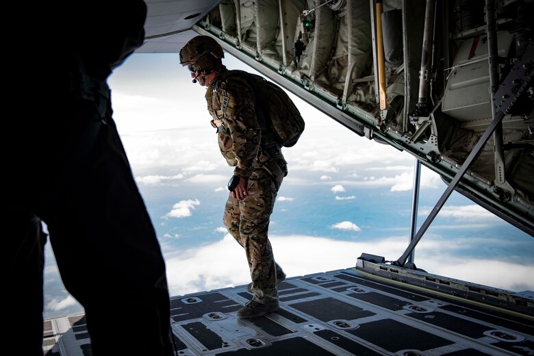 Air Force Reserve Survival, Evasion, Resistance and Escape specialists prepares to parachute out the ramp of a C-130J Super Hercules near Charleston, W. Va., Aug. 23, 2020. Eight C-130s and Reserve and Guard partners converge to participate in a week-long training event. The training scenario was designed to test the abilities of Air Force Reserve units to execute rapid global mobility missions in challenging, contested scenarios. (U.S. Air Force Reserve photo by Senior Airman Nathan Byrnes)