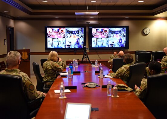 U.S. Air Force Tech. Sgt. Joseph Washington, 315th Training Squadron master military training leader, listens to Lt. Gen. Timothy Haugh, 16 Air Force commander, and Chief Master Sgt. Summer Leifer, 16 AF command chief, discuss the 16 AF’s intelligence community at Goodfellow Air Force Base, Texas, Aug. 17, 2020. Washington and other Airmen participated in a virtual information warfare all call. (U.S. Air Force photo by Airman 1st Class Ethan Sherwood)