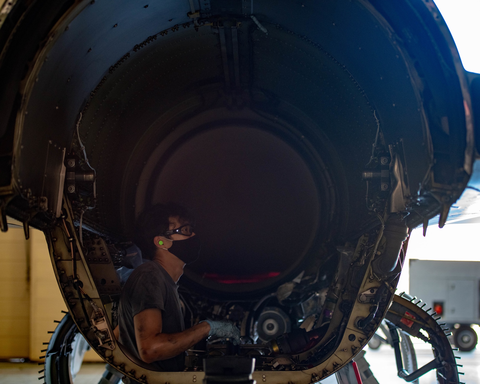 Republic of Singapore Air Force Military Expert One Staff Sgt. Concenciao Axel, 425th Fighter Squadron maintainer, inspects the inside of an F-16C Fighting Falcon Aug. 5, 2020, at Luke Air Force Base, Ariz.
