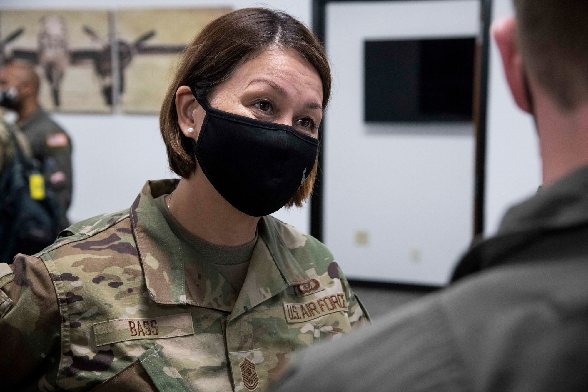 Chief Master Sgt. of the Air Force JoAnne S. Bass speaks with Maj. Michael Fleherty, 559th Flying Training Squadron instructor pilot, about the use of the electronic flight bag during a tour of Undergraduate Pilot Training 2.5 Aug. 20, 2020, at Joint Base San Antonio-Randolph, Texas. UPT 2.5 will scale lessons learned from Pilot Training Next and began in mid-July here and at Vance Air Force Base, Oklahoma.