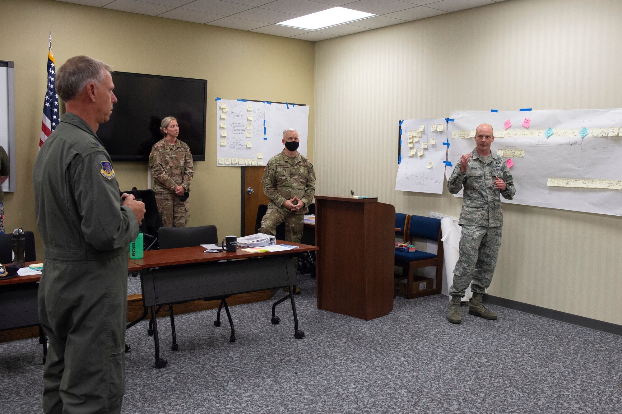 Master Sgt. Adam Evans, provides his part in a presentation during the continuous process improvement program to Col. Larry Shaw, 434th Air Refueling Wing commander, at Grissom Air Reserve Base, Indiana, July 30, 2020. The continuous process improvement team focused their efforts on improving the administrative discharge packages process. Their goal was to reach the Air Force standard on these packages while receiving 100 percent accuracy. (U.S. Air Force photo by Senior Airman Michael Hunsaker)