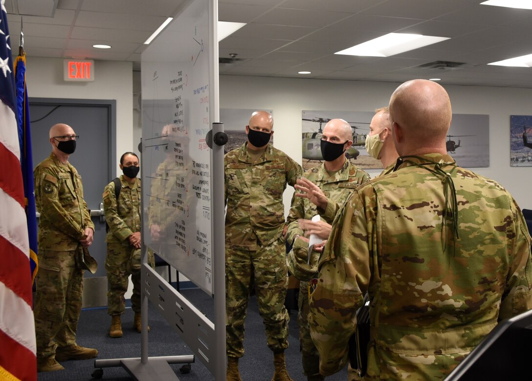 Airmen are briefed prior to a flight exercise.