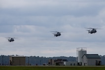 CH-53E Super Stallions with Marine Heavy Helicopter Squadron 366 and HMH-461 prepare to land during Exercise Deep Water 2020 at Marine Corps Air Station New River, North Carolina, July 29, 2020. The purpose of the exercise is to increase 2nd Marine Aircraft Wing’s interoperability and readiness on a scale that simulates peer-level threats. (U.S. Marine Corps photo by Lance Cpl. Elias E. Pimentel III)