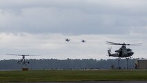 A UH-1Y Huey, AH-1Z Viper, and CH-53E Super Stallions with Marine Light Attack Helicopter Squadron 167 and Marine Heavy Helicopter Squadron 464 prepare to land during Exercise Deep Water 2020 at Marine Corps Air Station New River, North Carolina, July 29, 2020. The purpose of the exercise is to increase 2nd Marine Aircraft Wing’s interoperability and readiness on a scale that simulates peer-level threats. (U.S. Marine Corps photo by Lance Cpl. Elias E. Pimentel III)