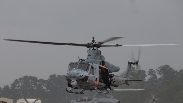 A UH-1Y Huey with Marine Light Attack Helicopter Squadron 167 flies during Exercise Deep Water 2020 at Marine Corps Air Station New River, North Carolina, July 29, 2020. The purpose of the exercise is to increase 2nd Marine Aircraft Wing’s interoperability and readiness on a scale that simulates peer-level threats. (U.S. Marine Corps photo by Lance Cpl. Elias E. Pimentel III)