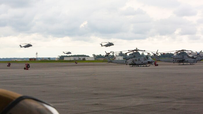 U.S Marine Corps CH-53E Super Stallion’s with Marine Heavy Helicopter Squadron 366 land during Exercise Deep Water 2020 at Marine Corps Air Station New River, North Carolina, July 29, 2020. The purpose of the exercise is to increase 2nd Marine Aircraft Wing's interoperability and readiness on a scale that simulates peer-level threats. (U.S Marine Corps Photo by Cpl. Juan C. Dominguez)