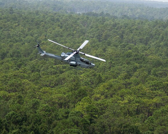 An AH-1Z Viper with Marine Light Attack Helicopter Squadron 269 flies over Marine Corps Base Camp Lejeune, North Carolina, July 31, 2020. HMLA-269 practiced close air support and aerial surveillance to maintain mission readiness. (U.S. Marine Corps photo by Cpl. Cody Rowe)