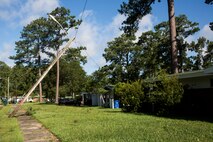 A power line lies partially fallen from Hurricane Isaias at base housing on Marine Corps Air Station New River, North Carolina, Aug. 4, 2020. U.S. Marines carried out recovery efforts in order to resume normal operations while following COVID-19 mitigation guidelines. (U.S. Marine Corps Photo by Lance Cpl. Christian Ayers)