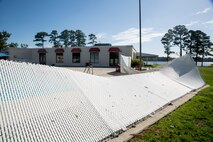 The Landing’s fence lies bent from Hurricane Isaias on Marine Corps Air Station New River, North Carolina, Aug. 4, 2020. U.S. Marines carried out recovery efforts in order to resume normal operations while following COVID-19 mitigation guidelines. (U.S. Marine Corps Photo by Lance Cpl. Christian Ayers)