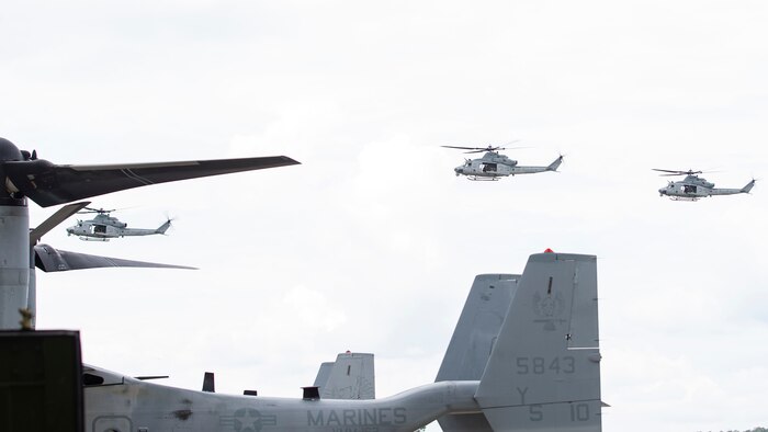 AH-1W Super Cobras with Marine Light Attack Helicopter Squadron 167, Marine Air Group 29 fly at Marine Corps Air Station New River, North Carolina, Aug. 13, 2020. These aircraft recently arrived from a deployment with the 26th Marine Expeditionary Unit and will be deactivated. The aircraft will be going to different museums for preservation. (U.S. Marine Corps photo by Lance Cpl. Yuritzy Gomez)