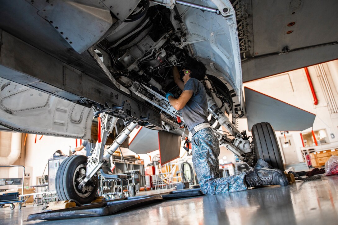 Republic of Singapore Air Force Military Expert One Staff Sgt. Concenciao Axel, 425th Fighter Squadron maintainer, performs maintenance on an F-16C Fighting Falcon, Aug. 5, 2020, at Luke Air Force Base, Ariz.