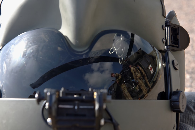 U.S. Army aircrew, assigned to the 1st Battalion 228th Aviation Regiment Air Ambulance Detachment at Joint Task Force-Bravo, prepare their gear for a medical evacuation training exercise at Soto Cano Air Base, Honduras July 31, 2020. The 1-228 Charlie Company aeromedical evacuation area of responsibility spans 31 countries and 16 dependencies.