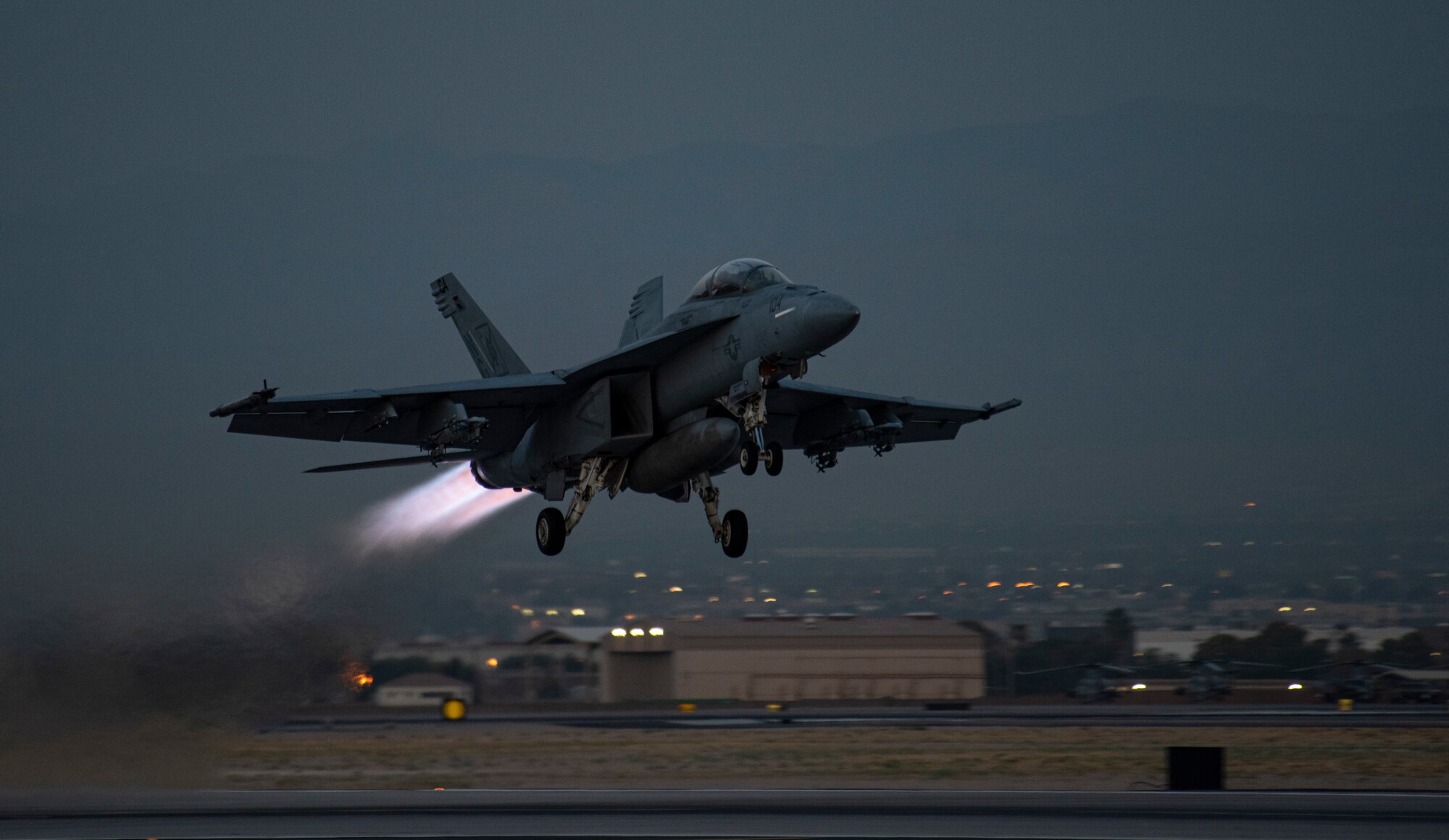 Aircraft takes off from the flight line.