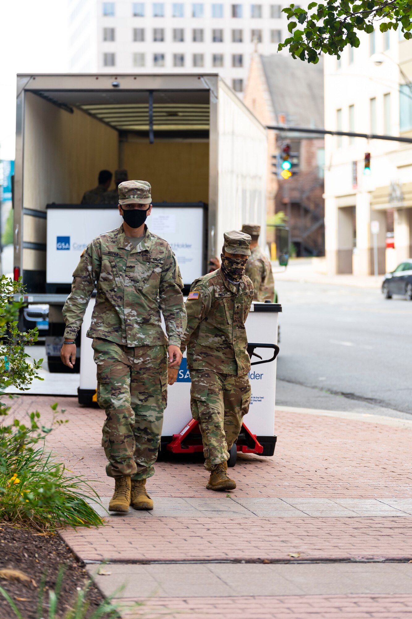 Connecticut Army National Guard Soldiers deliver COVID-19 testing kits from the Governor William A. O'Neill State Armory to a storage facility in Hartford Aug. 14, 2020. The testing kits are being stored in preparation for a potential outbreak in the fall.