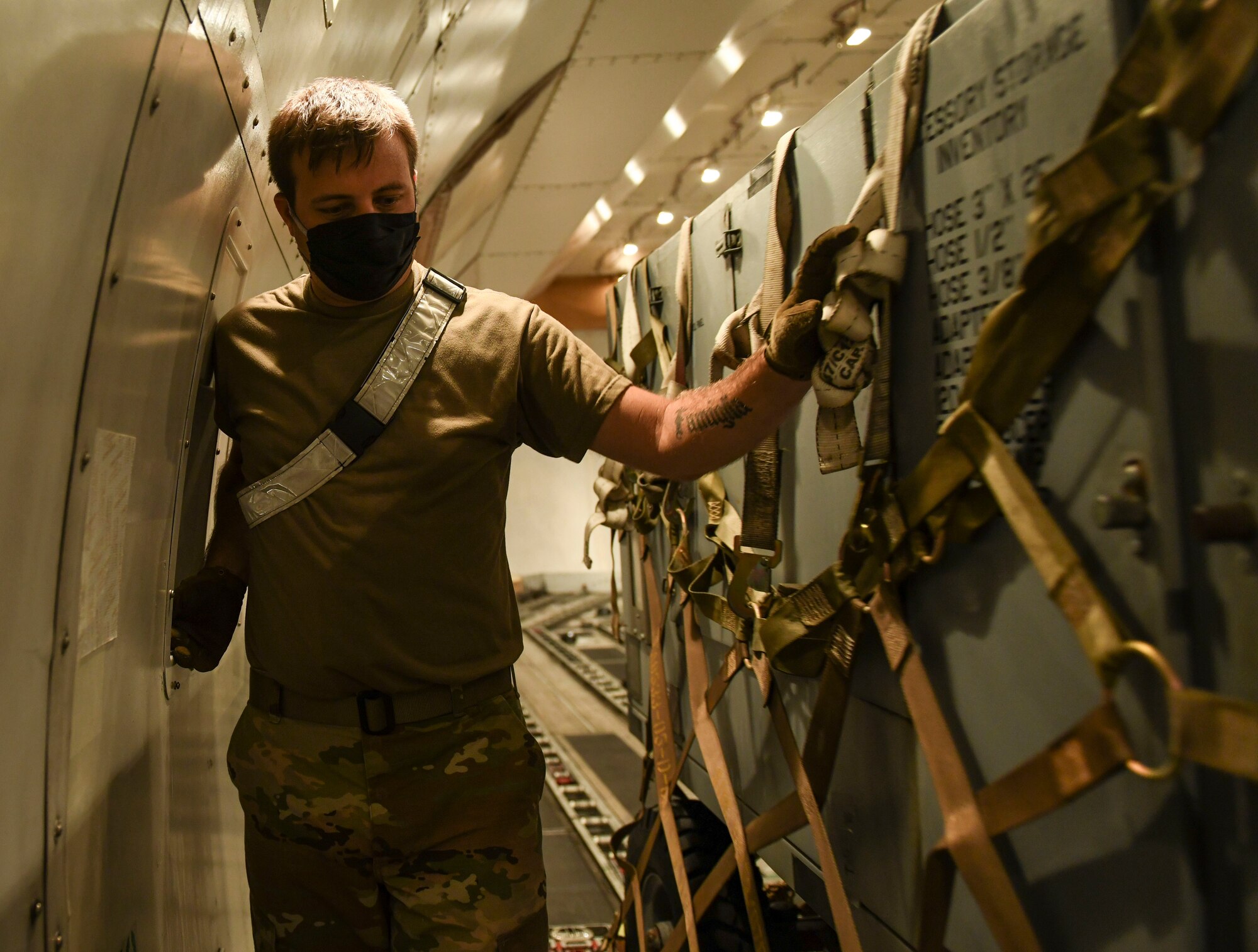 Staff Sgt. Reece Headley, 509th Logistics Readiness Squadron logistics technician, deployed from Whiteman Air Force Base, Missouri, unloads cargo at Naval Support Facility Diego Garcia, Aug 12, 2020. More than 200 members from Team Whiteman deployed along with three B-2 Spirit Stealth Bombers to support bomber task force missions. Deployments such as these test the readiness of the Airmen and equipment, as well as their collective ability to operate at forward locations. U.S. Strategic Command routinely conducts operations across the globe to demonstrate U.S. commitment to the security and stability of the Indo-Pacific region. (U.S. Air Force photo by Tech. Sgt. Heather Salazar)