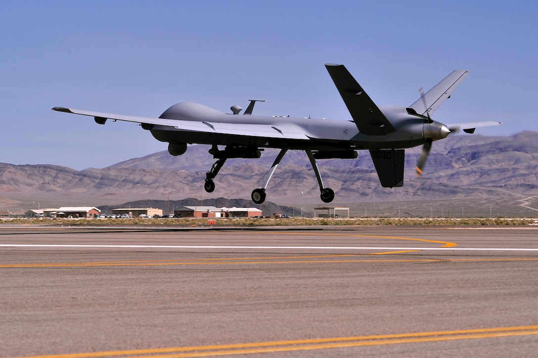 An MQ-9 Reaper remotely piloted aircraft takes off on a training mission, May 13, 2013. The Reaper is part of a remotely piloted aircraft system. A fully operational system consists of several sensor/weapon-equipped aircraft, ground control station, Predator Primary Satellite Link, and spare equipment along with operations and maintenance crews for deployed 24-hour missions. (U.S. Air Force photo by 432nd Wing/432nd Air Expeditionary Wing/Released)