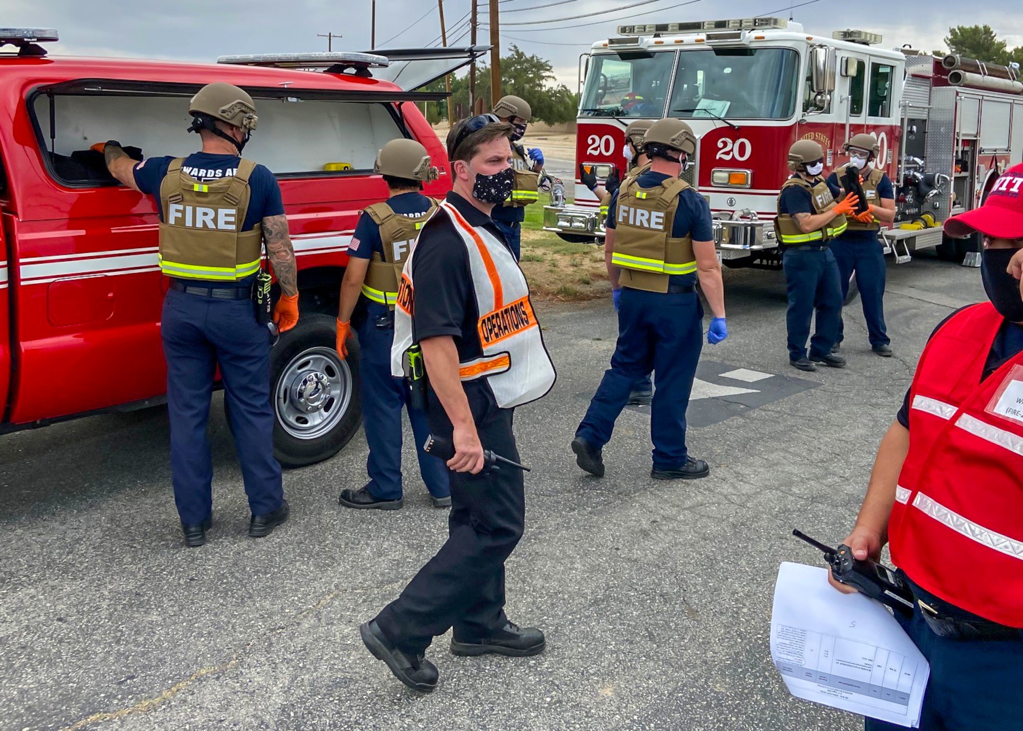 Members of the Edwards AFB Fire & Emergency Services and 412th Security Forces Squadron react during an active-shooter exercise at Edwards Air Force Base, California, Aug. 12 and 13. The two services employed the Rescue Task Force concept which aims to bring a quicker response time for victims.  (Air Force photo by Tech. Sgt. Felix Colon)