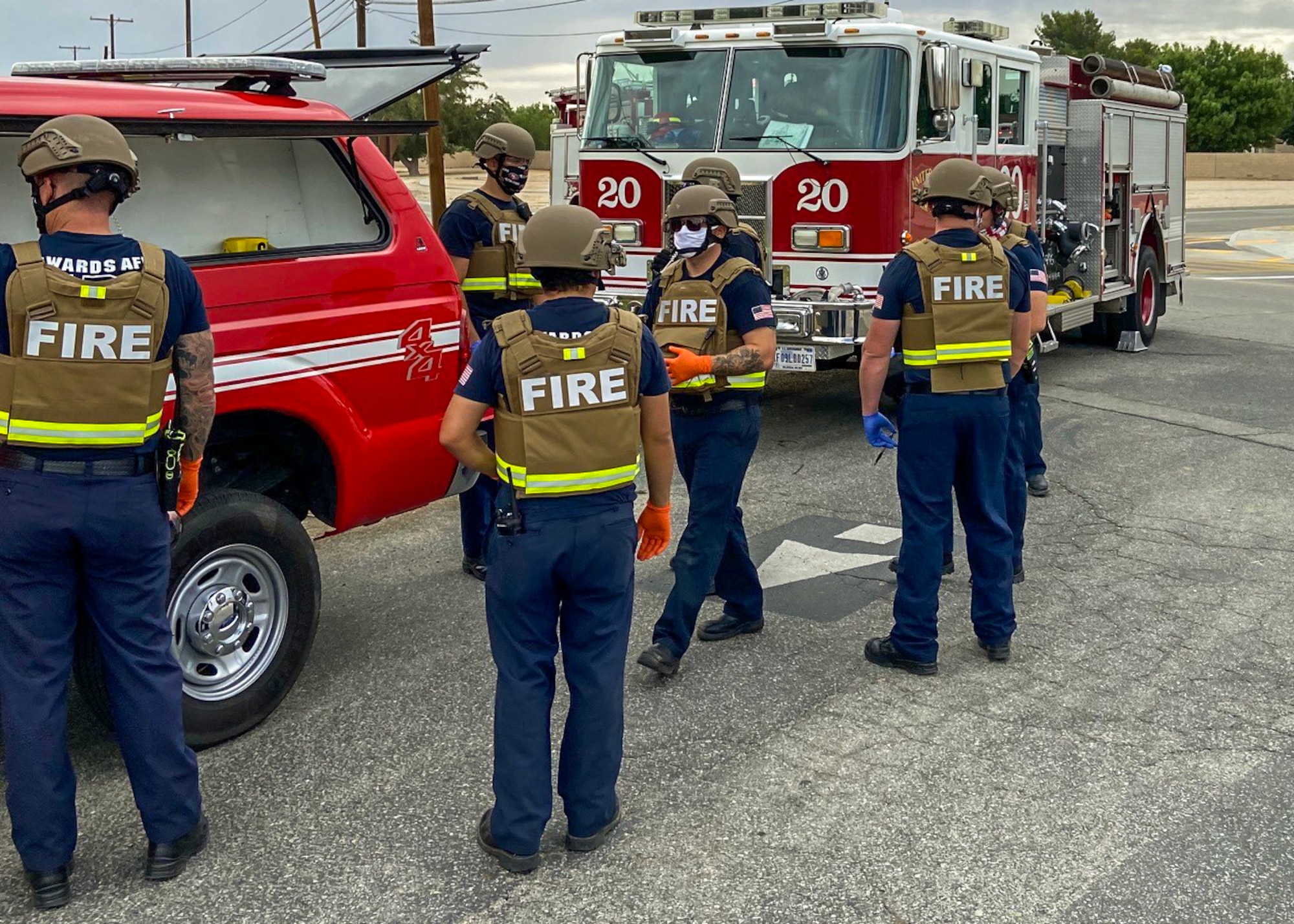 Members of the Edwards AFB Fire & Emergency Services and 412th Security Forces Squadron react during an active-shooter exercise at Edwards Air Force Base, California, Aug. 12 and 13. The two services employed the Rescue Task Force concept which aims to bring a quicker response time for victims.  (Air Force photo by Tech. Sgt. Felix Colon)