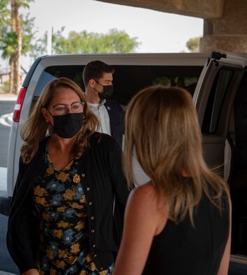 Wife of Secretary of Defense arrives at Nellis.