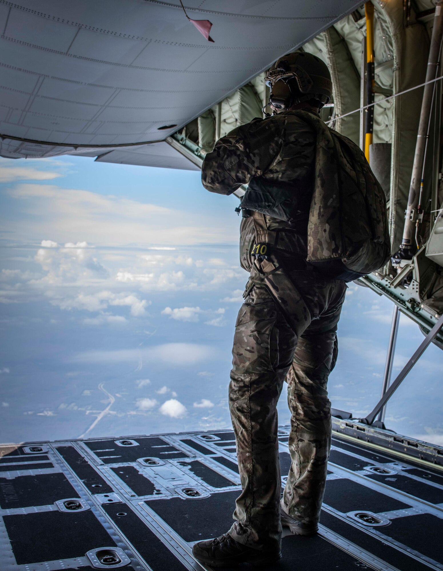 Air Force Reserve Survival, Evasion, Resistance and Escape specialists prepares to parachute out the ramp of a C-130J Super Hercules near Charleston, W. Va., Aug. 23, 2020. Eight C-130s and Reserve and Guard partners converged to participate in a week-long training event. The training scenario was designed to test the abilities of Air Force Reserve units to execute rapid global mobility missions in challenging, contested scenarios. (U.S. Air Force Reserve photo by Senior Airman Nathan Byrnes)