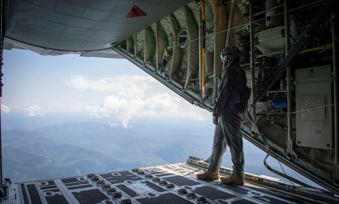 Air Force Reserve Survival, Evasion, Resistance and Escape specialists prepares to parachute out the ramp of a C-130J Super Hercules near Charleston, W. Va., Aug. 23, 2020. Eight C-130s and Reserve and Guard partners converge to participate in a week-long training event. The training scenario was designed to test the abilities of Air Force Reserve units to execute rapid global mobility missions in challenging, contested scenarios. (U.S. Air Force Reserve photo by Senior Airman Nathan Byrnes)