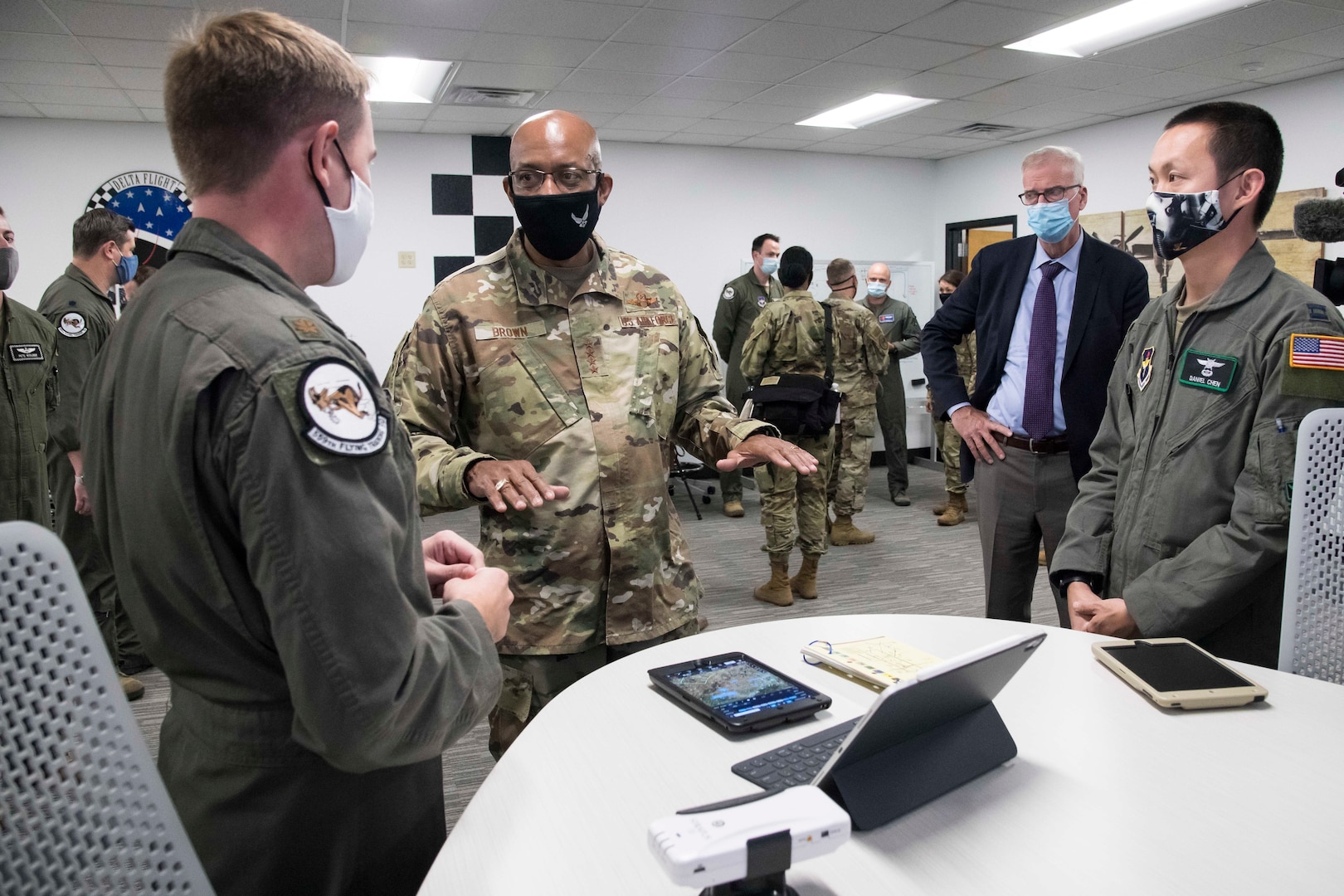 Chief of Staff of the Air Force Gen. Charles Q. Brown Jr. speaks with Maj. Michael Fleherty, 559th Flying Training Squadron instructor pilot, about the use of the electronic flight bag during a tour of Undergraduate Pilot Training 2.5 Aug. 20, 2020, at Joint Base San Antonio-Randolph, Texas. Brown, along with Secretary of the Air Force Barbara Barrett and Chief Master Sgt. JoAnne Bass, saw first-hand Air Education and Training Command’s efforts to modernize pilot training that will produce pilots able to meet 21st Century missions.