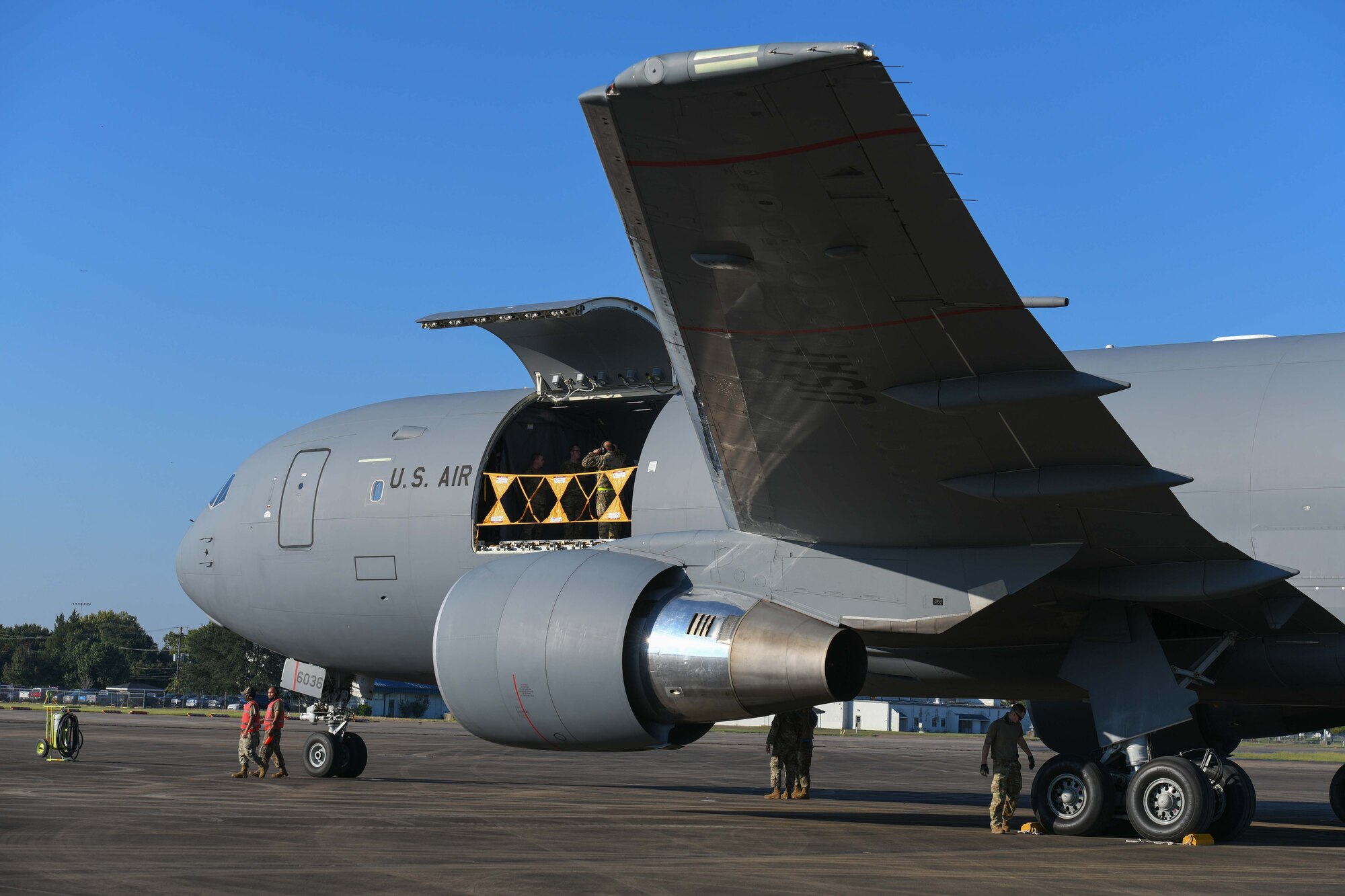 An aircraft is parked on the flight line