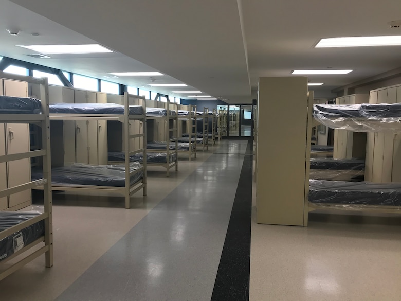 Line of laundry machines and dryers.