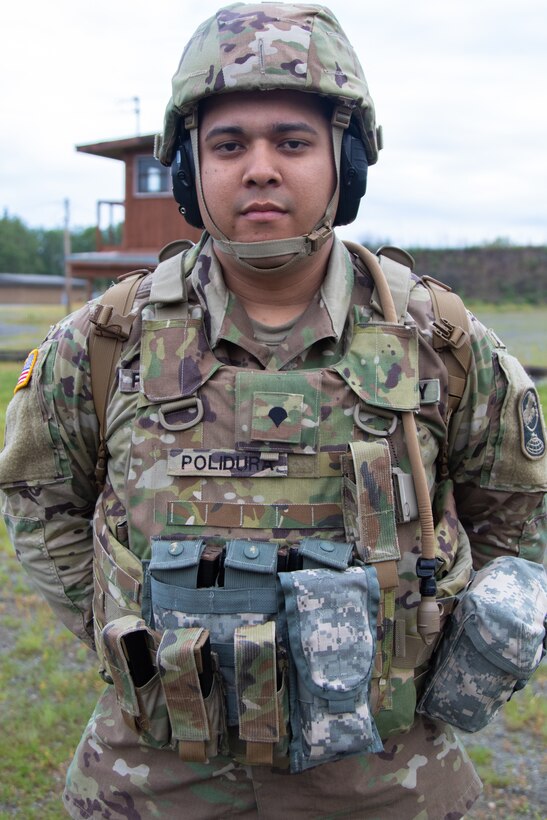 Alaska Army National Guard Spc. Carlos Polidura is a military police Soldier serving in the Military Police Ground Based Interceptor Security Company, participating in a course of fire Aug. 2, 2020, during the 2020 Alaska National Guard Adjutant General Match at Joint Base Elmendorf-Richardson. TAG Match is a marksmanship competition comprising several timed pistol and rifle events. (U.S. Army National Guard photo by Spc. Marc Marmeto/Released).