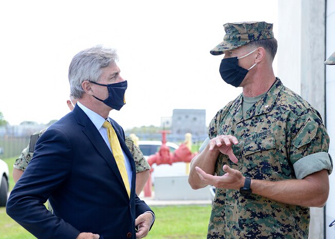 Secretary of the Navy Kenneth J. Braithwaite is greeted by Lt. Col. Michael Weber, commanding officer of Marine Corps Security Force Battalion, prior to his tour during his visit to the Waterfront Security Force Facility at Naval Submarine Base Kings Bay, Ga.