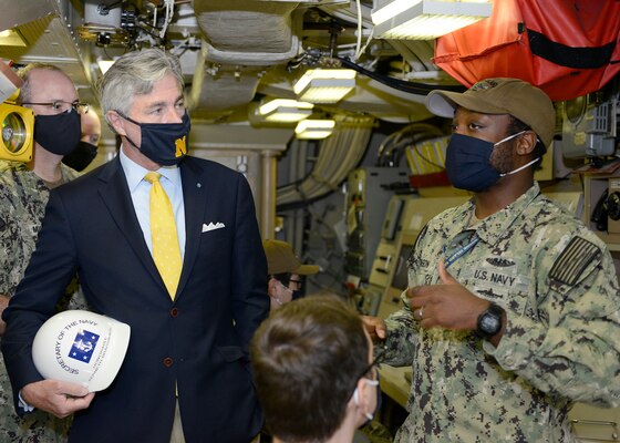 Secretary of the Navy Kenneth J. Braithwaite talks with Missile Technician 1st Class Tremayne Johnson, aboard the Ohio-class ballistic-missile submarine USS Rhode Island (SSBN 740) (Blue) in the ship’s missile control center during his visit to Naval Submarine Base Kings Bay, Ga.