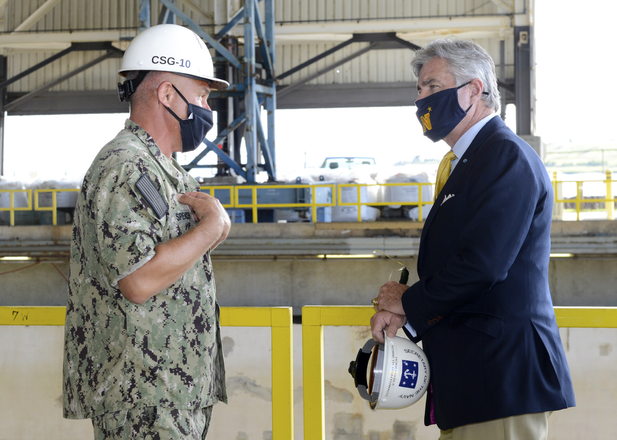 Secretary of the Navy Kenneth J. Braithwaite tours the largest covered dry dock in the U.S. with Rear Adm. John Spencer, commander of Submarine Group Ten, during his visit to Naval Submarine Base Kings Bay, Ga.